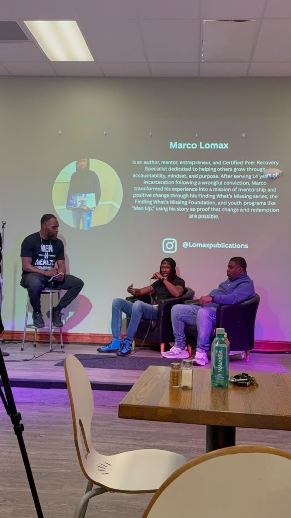 Marco Lomax speaking on a mentorship panel