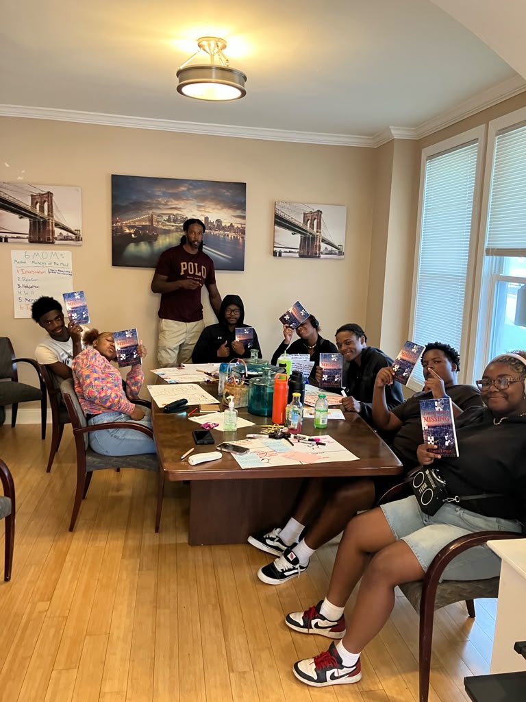 Marco Lomax leading a Finding What's Missing youth mentorship session